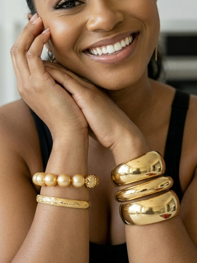 Women’s bracelets including gold chain bracelets, bangles, and statement cuffs for layering and elegant fashion styling