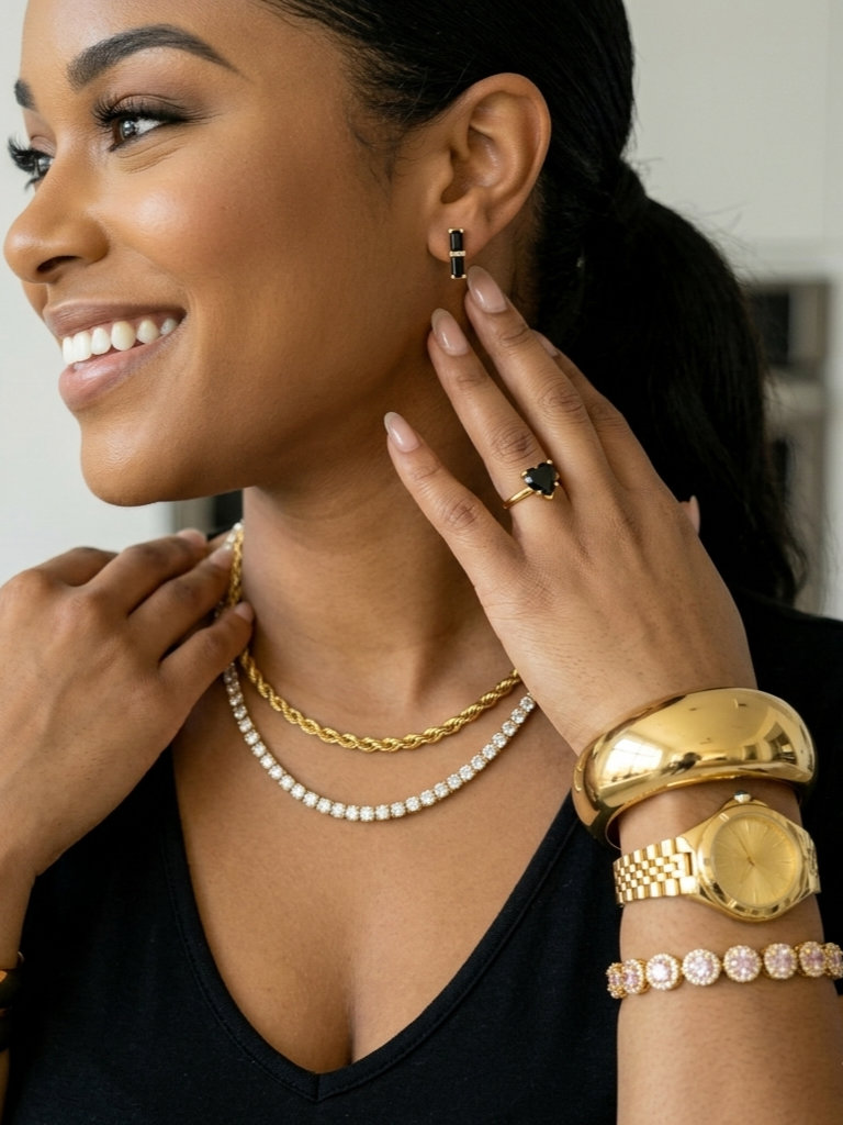 gold necklace, bracelet and earrings