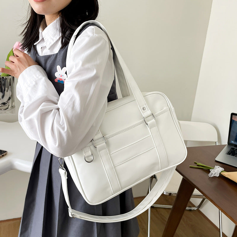 Bolso de hombro de cuero sintético de color liso para portátil