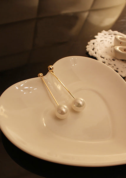 Gold-plated long pearl drop earrings