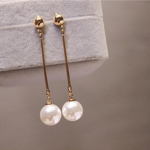 Gold-plated long pearl drop earrings