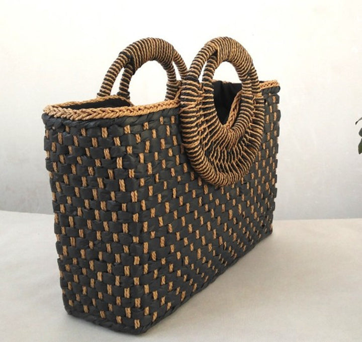 Bolso de playa de mano con asa de madera