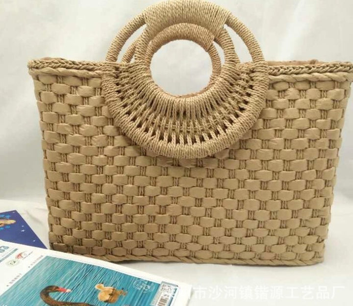 Bolso de playa de mano con asa de madera