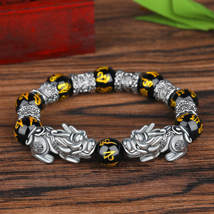 Pulsera de la suerte de plata antigua con cuentas de obsidiana