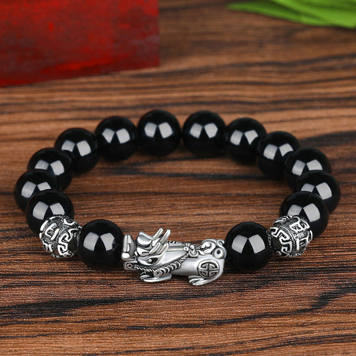 Pulsera de la suerte de plata antigua con cuentas de obsidiana