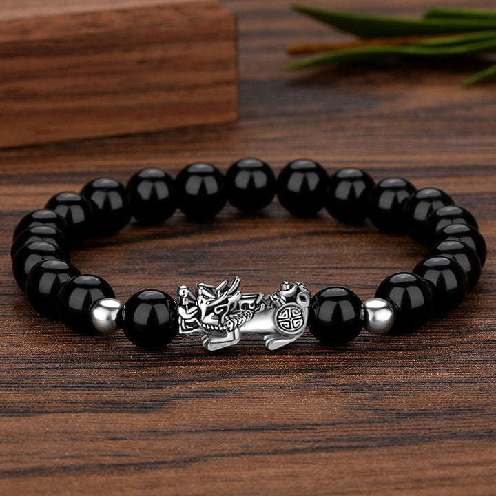 Pulsera de la suerte de plata antigua con cuentas de obsidiana