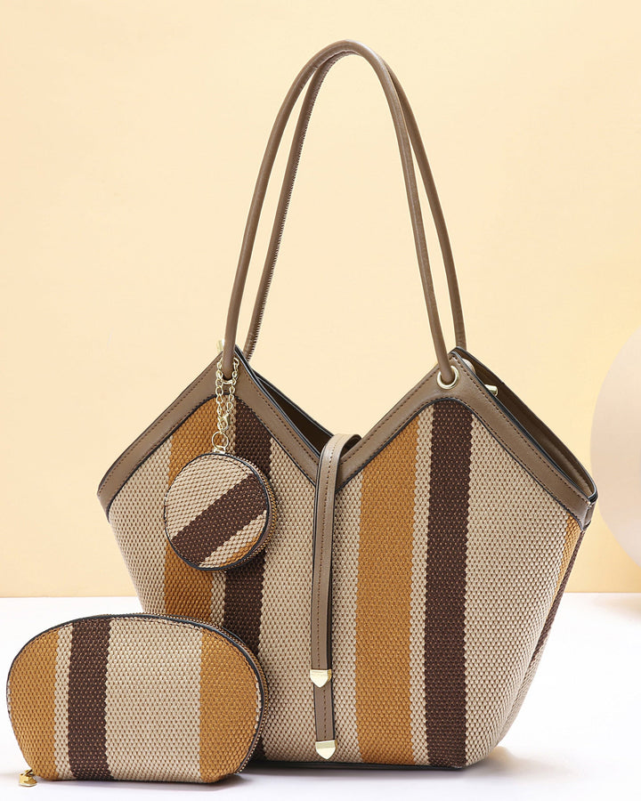 Striped handbag with matching pouch on a light beige background