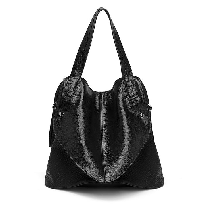 Bolso de mano negro de piel suave informal con carita sonriente