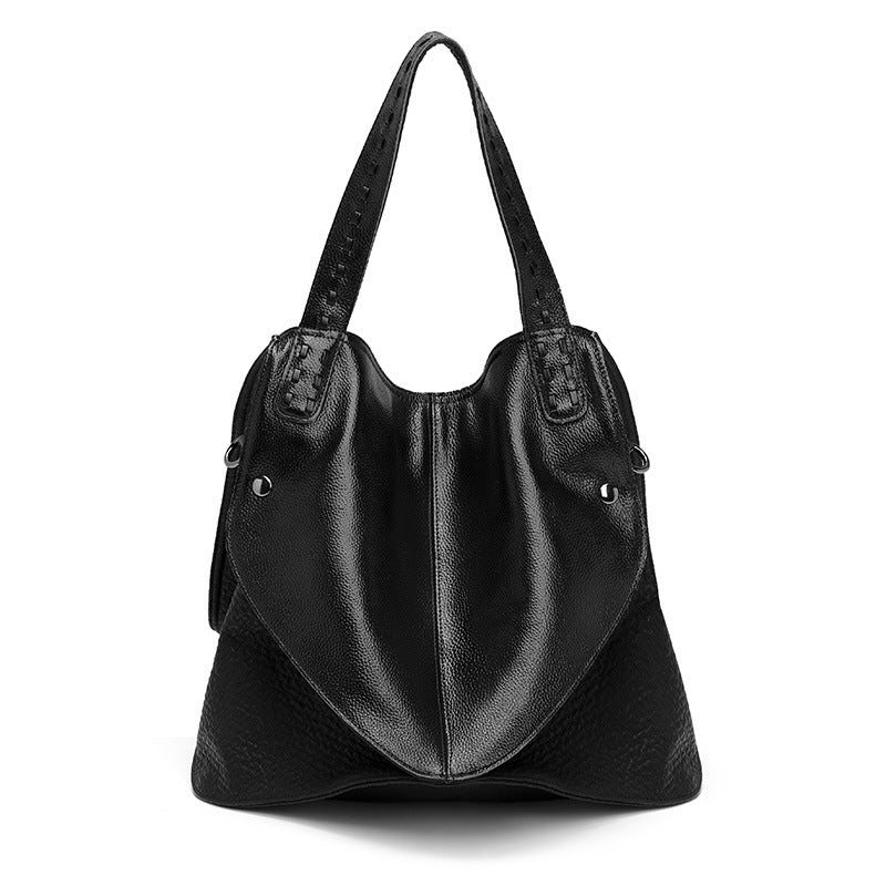 Bolso de mano negro de piel suave informal con carita sonriente