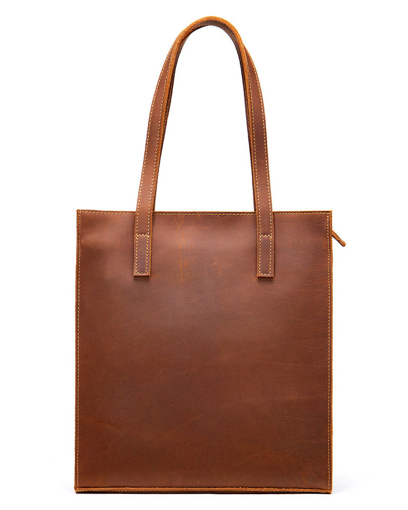 Brown leather tote bag on a white background