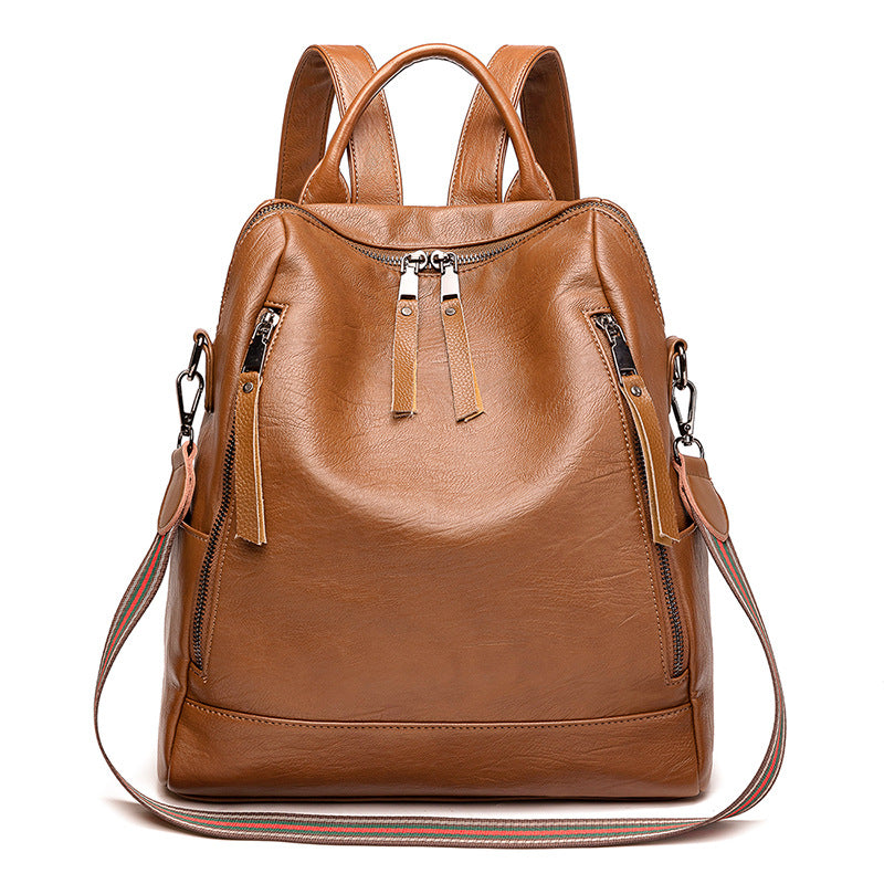 Mochila de cuero minimalista versátil e informal para mujer