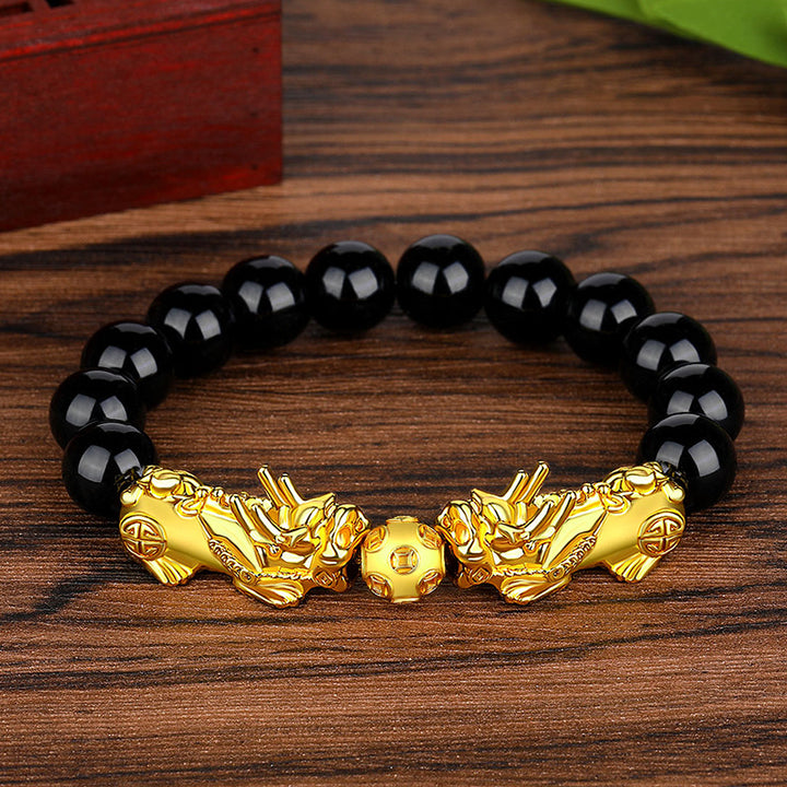Pulsera de la suerte de plata antigua con cuentas de obsidiana