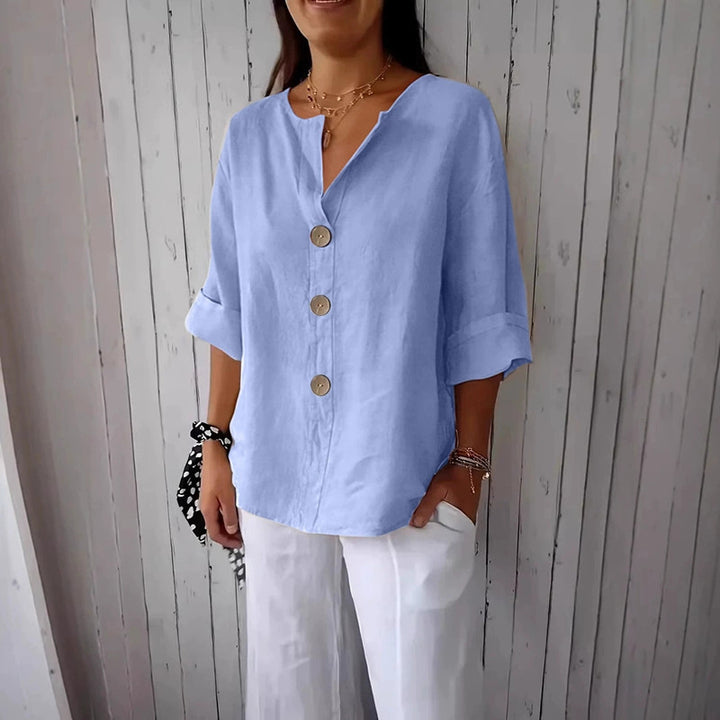 Blusa cómoda de algodón y lino con cuello en V y botones