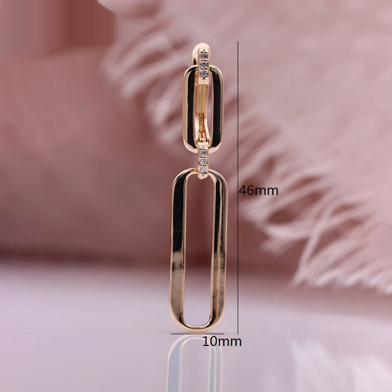 Pendientes largos colgantes de oro rosa huecos con microincrustaciones de circonita natural