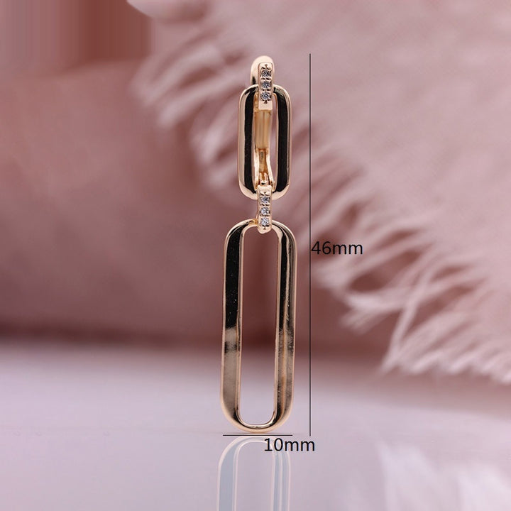 Pendientes largos colgantes de oro rosa huecos con microincrustaciones de circonita natural