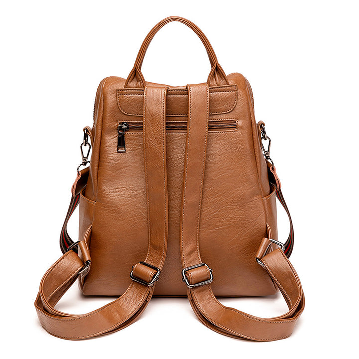 Mochila de cuero minimalista versátil e informal para mujer