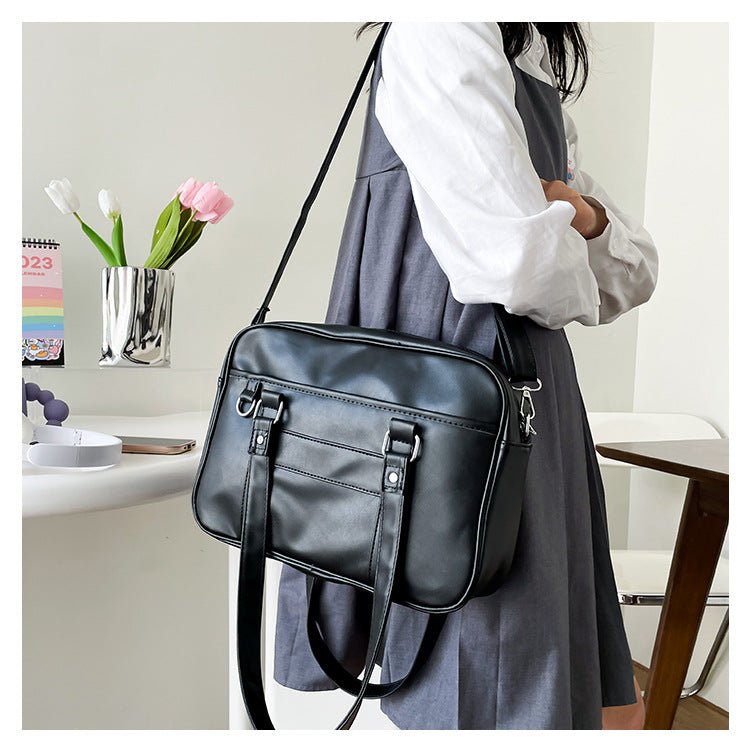 Bolso de hombro de cuero sintético de color liso para portátil