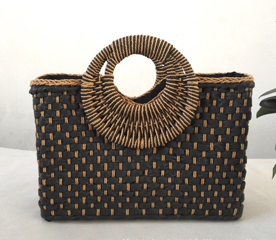 Bolso de playa de mano con asa de madera
