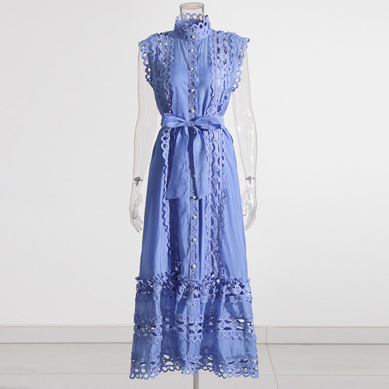 Blue lace dress on a mannequin against a white background