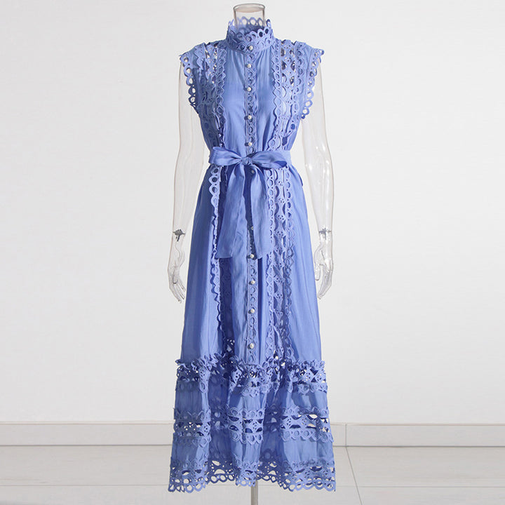 Blue lace dress on a mannequin against a white background
