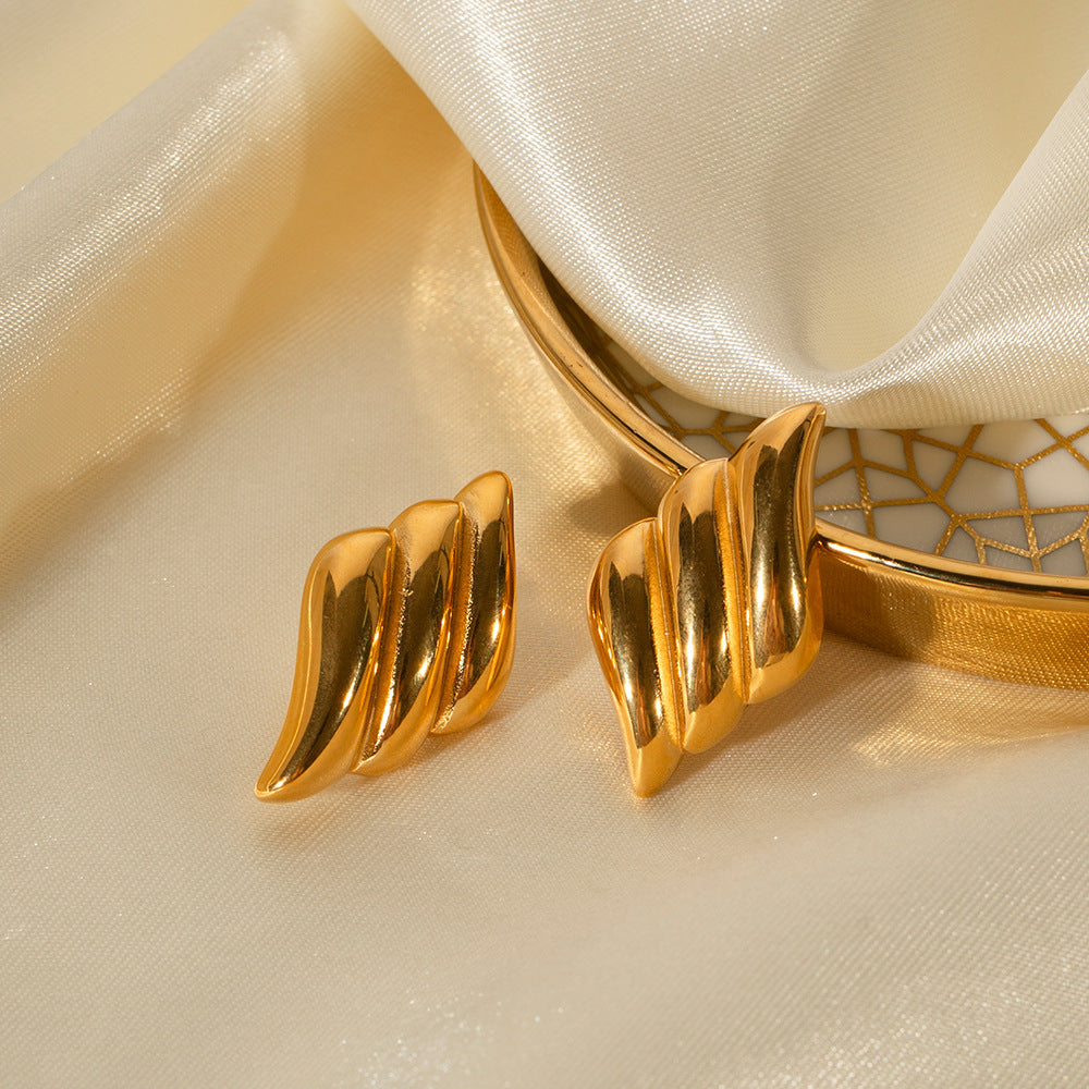 Pendientes grandes geométricos de oro y plata