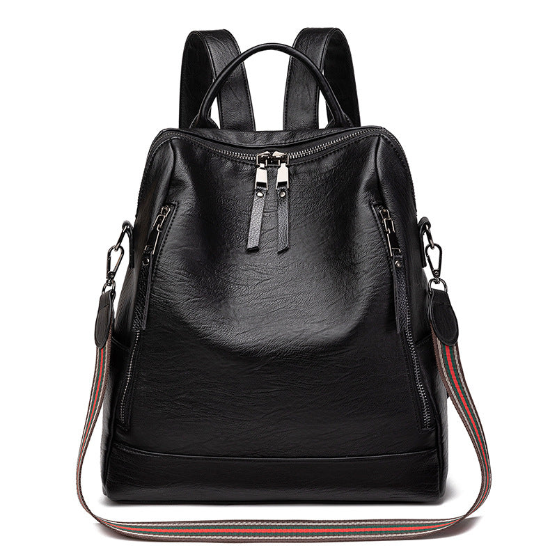 Mochila de cuero minimalista versátil e informal para mujer