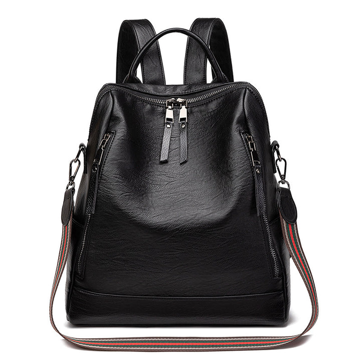 Mochila de cuero minimalista versátil e informal para mujer
