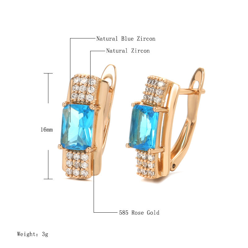 Pendientes de mujer de oro rosa con rosa azul natural y a la moda