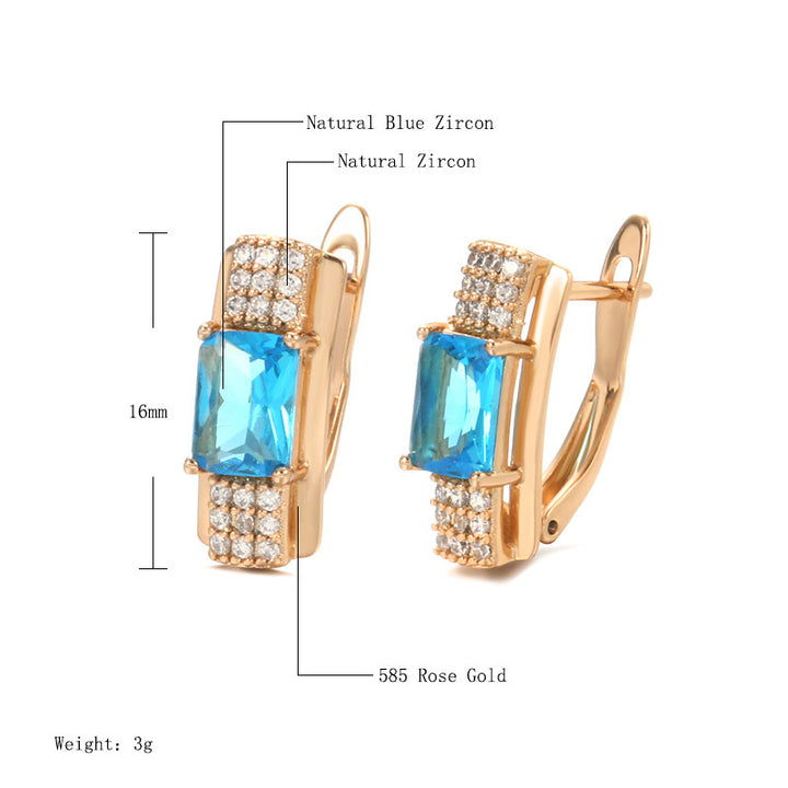 Pendientes de mujer de oro rosa con rosa azul natural y a la moda