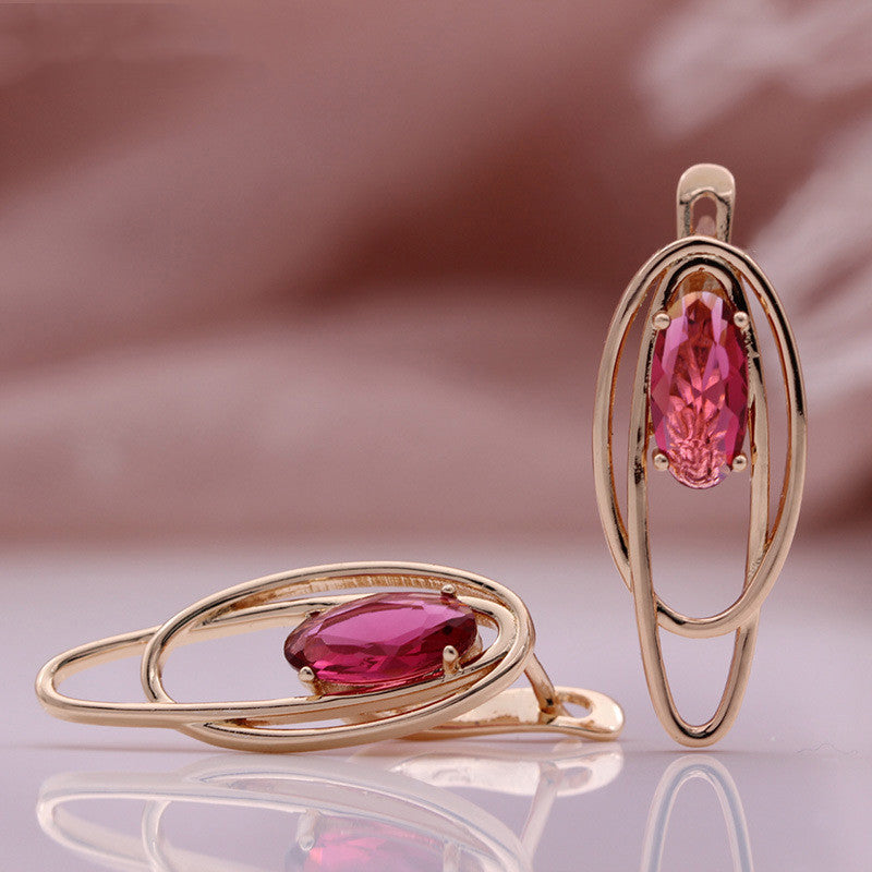 Pendientes de circonita de color huecos circulares de coco de oro rosa