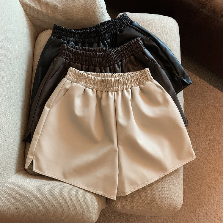 Pantalones cortos de cuero PU para mujer, cintura alta, sueltos, con abertura, informales