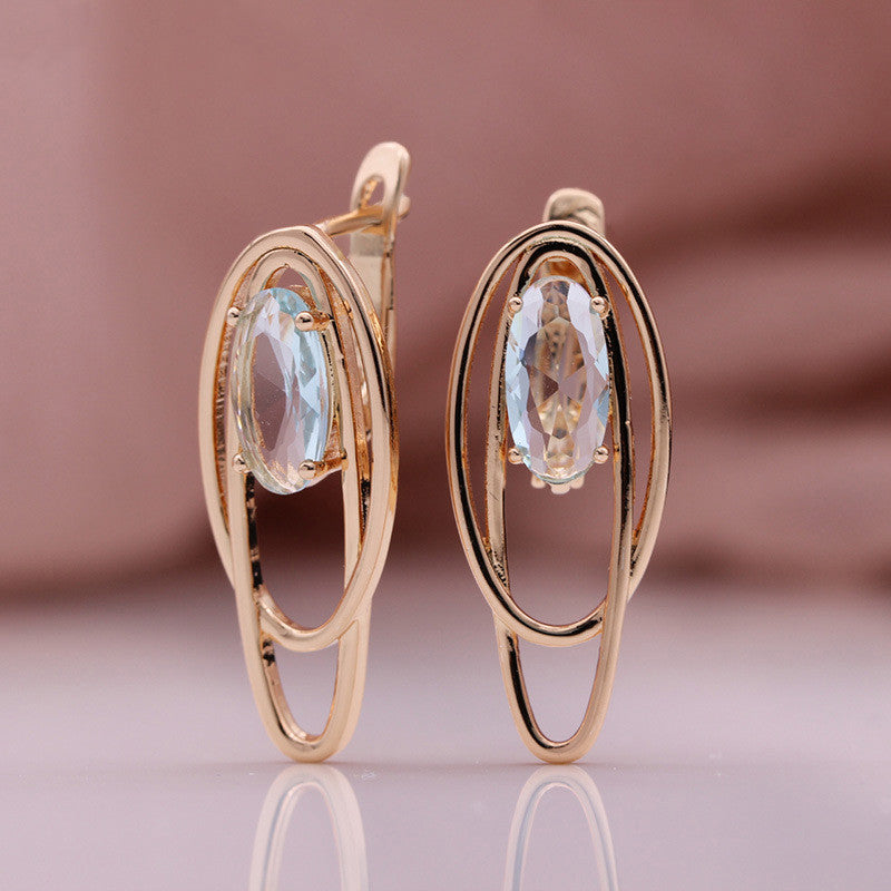 Pendientes de circonita de color huecos circulares de coco de oro rosa